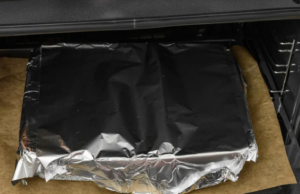 Chowhound Why Aluminum Foil Sticks To Food In The Oven (And How To Fix It)